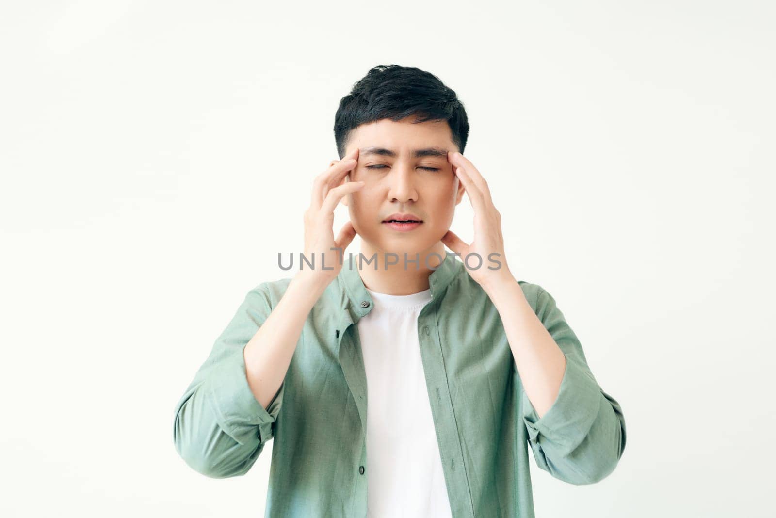 man feel headache with white background, asian