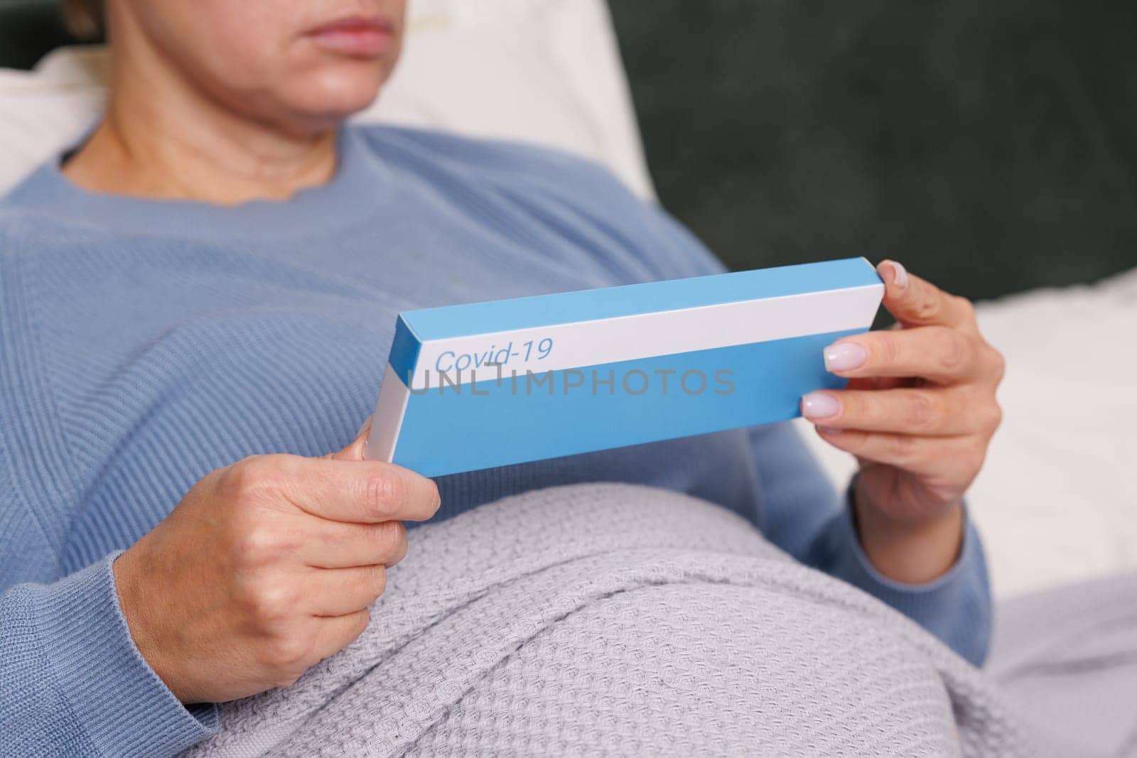 woman tests herself for new coronavirus strain at home, test for detection of covid-19 antigens and flu viruses, diagnosis of disease