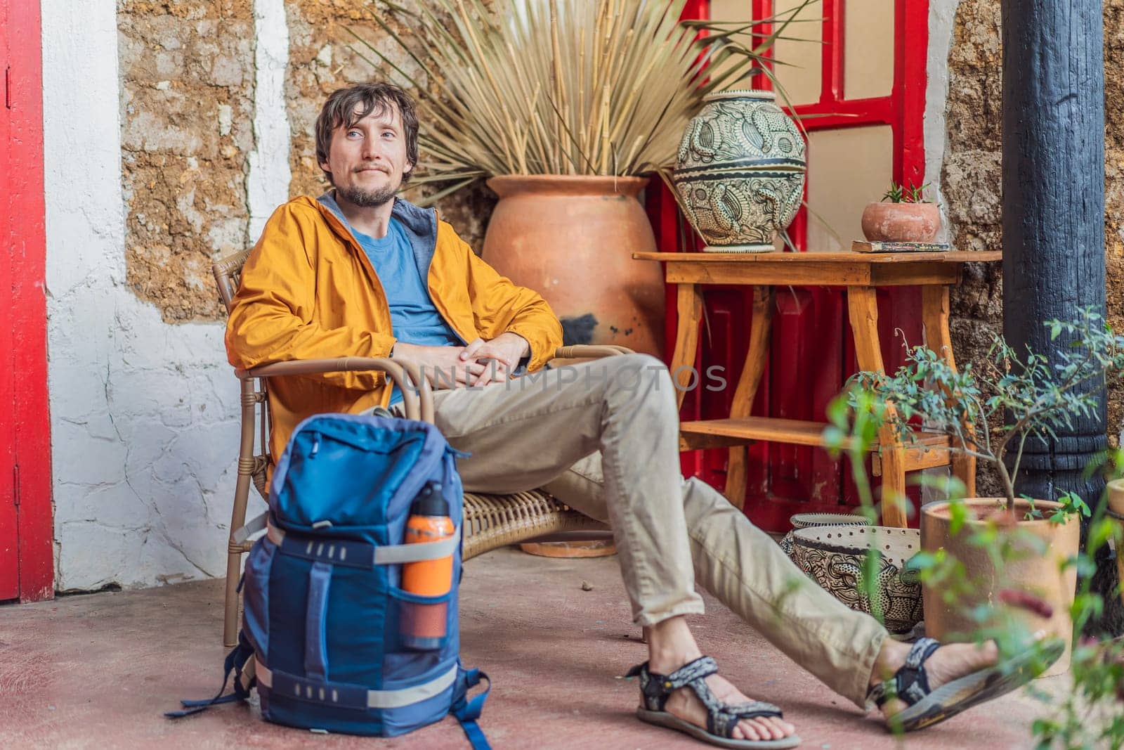 Male tourist in a colonial house in San Cristobal de las Casas, Mexico. Cultural exploration, architecture, and travel experience concept.