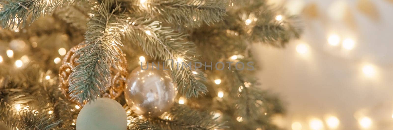 Christmas balls in close-up on the Christmas tree. Decorations for Christmas trees. The concept of celebrating New Year and Christmas
