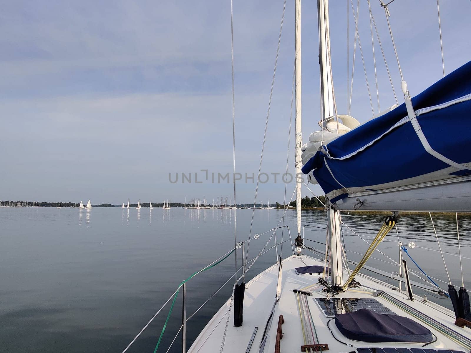 Espoo, Finland - September 3, 2024: view of the sailing regatta on the Baltic Sea in Finland. Calm sea water, Regatta sailboat