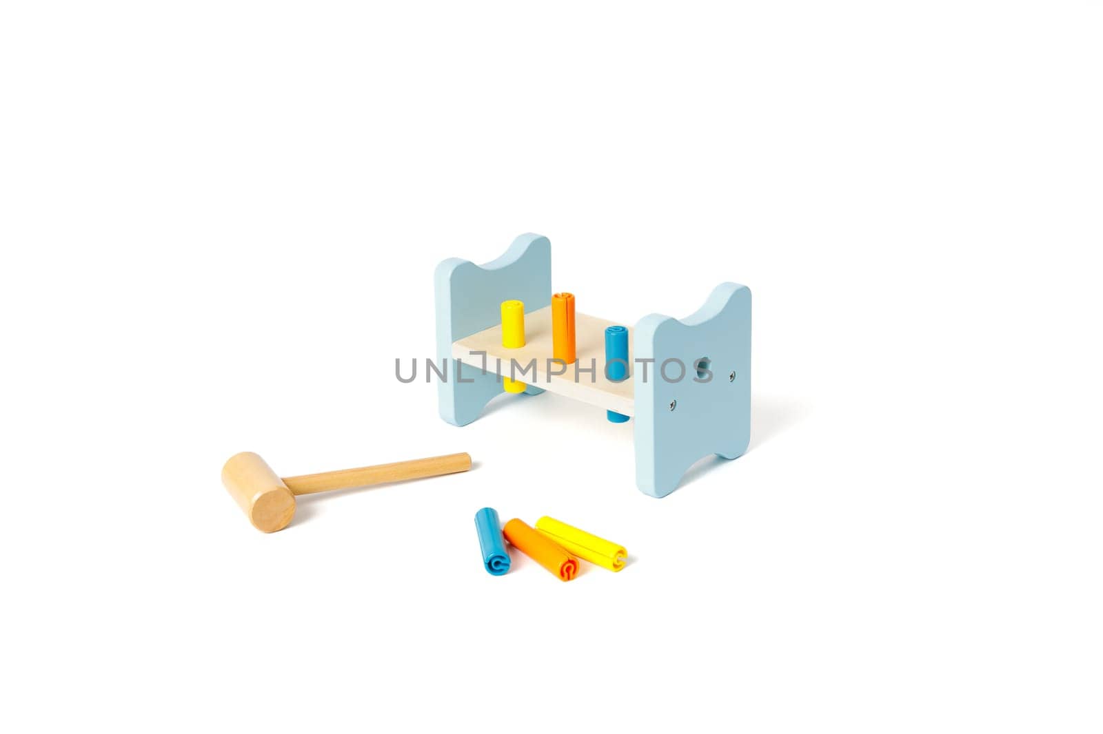 Wooden education toy for motor skills development isolated on white background.
