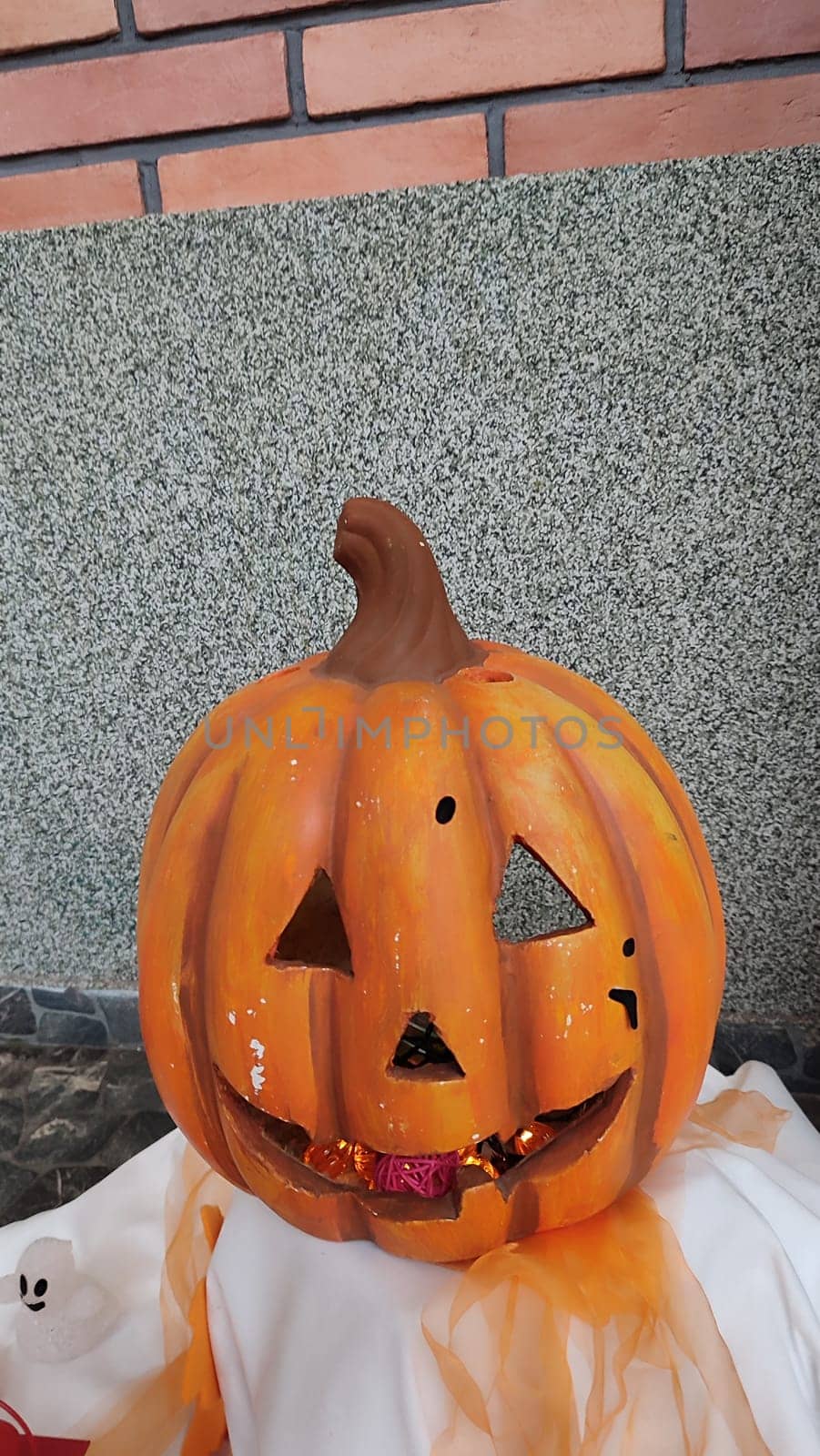 halloween, orange pumpkin, holiday decorative elements, autumn maple leaves decoration symbol objects. High quality photo