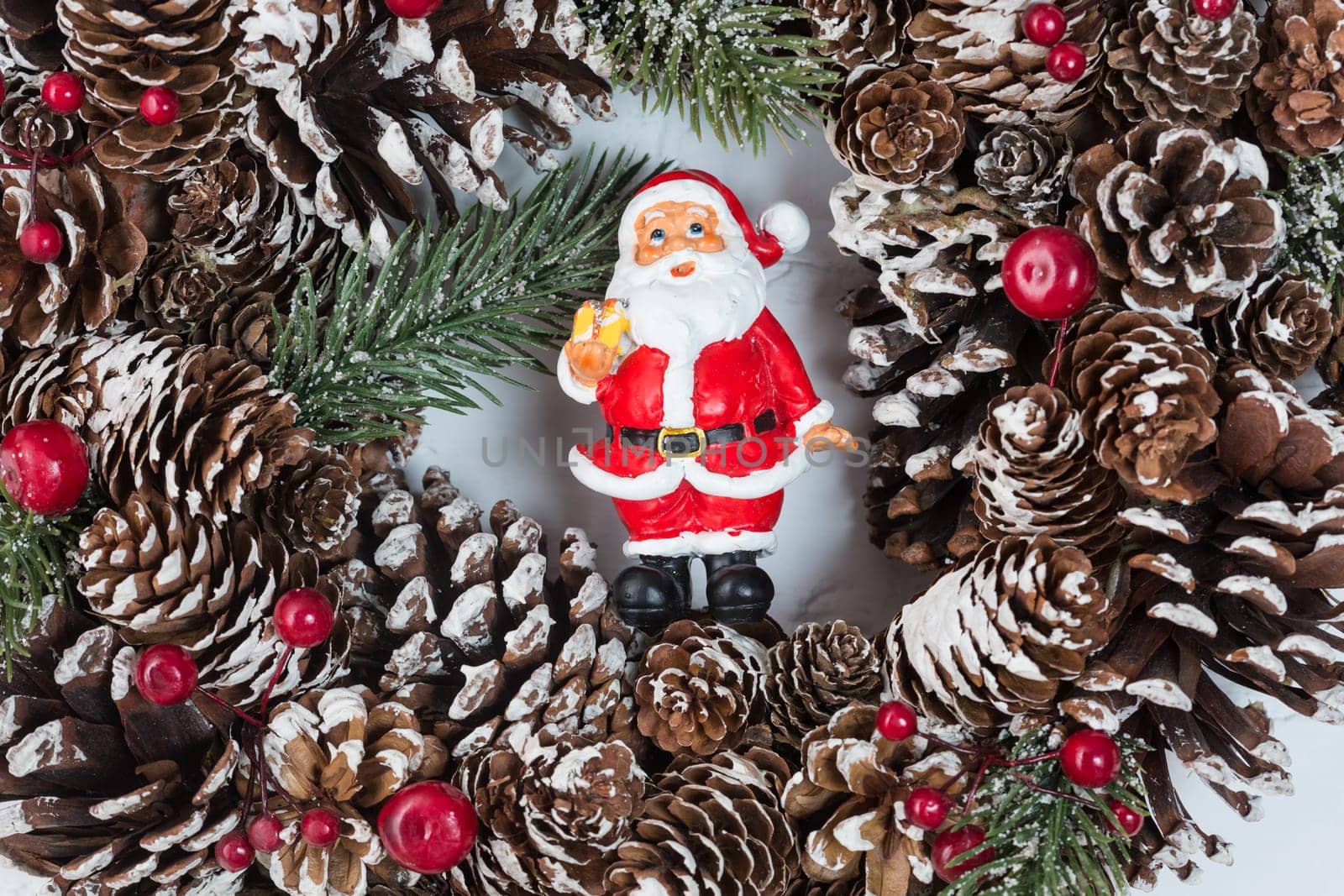 Elegant christmas wreath decorated pine cones and fir trees. Christmas mood