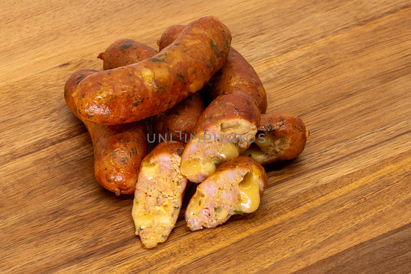 Savory grilled sausages that skillfully showcase a beautifully golden crust paired with a juicy, flavorful filling