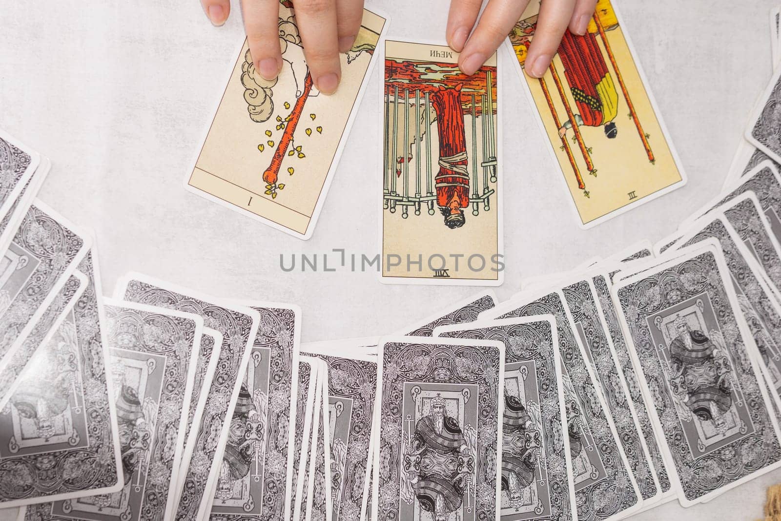 TVER, RUSSIA - FEBRUARY 18, 2024. Tarot cards, Tarot card divination, fortune telling. Occultism, esoteric education