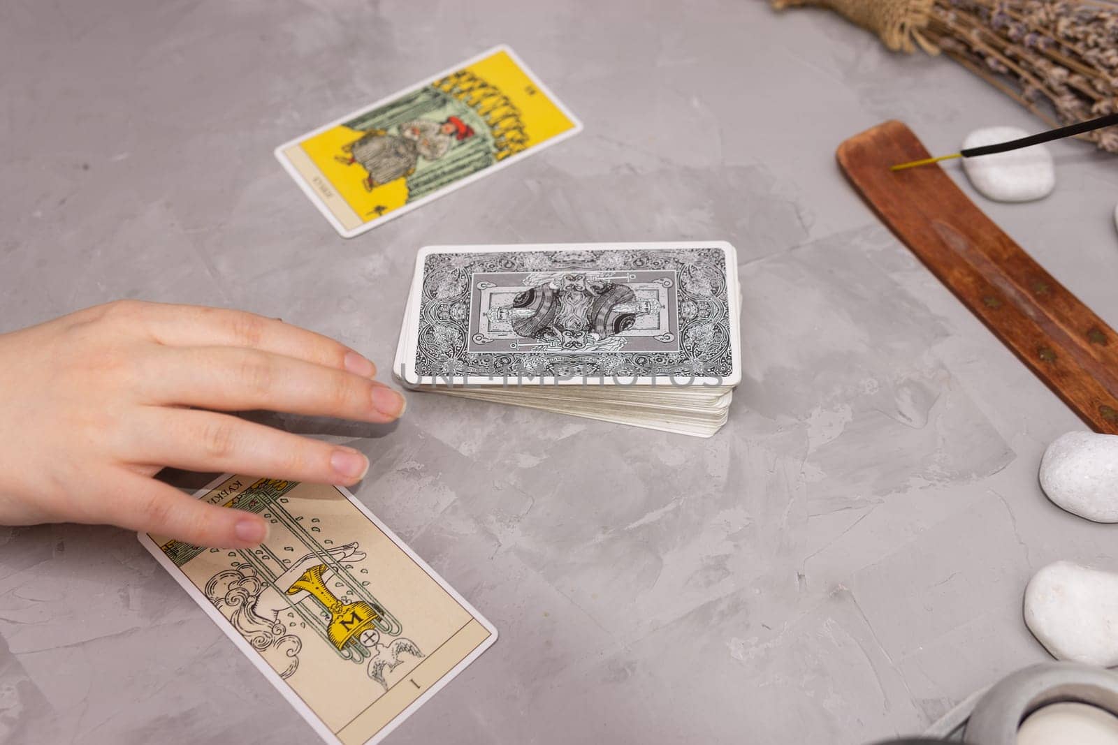 TVER, RUSSIA - FEBRUARY 18, 2024. Tarot cards, Tarot card divination, fortune telling. Occultism, esoteric education