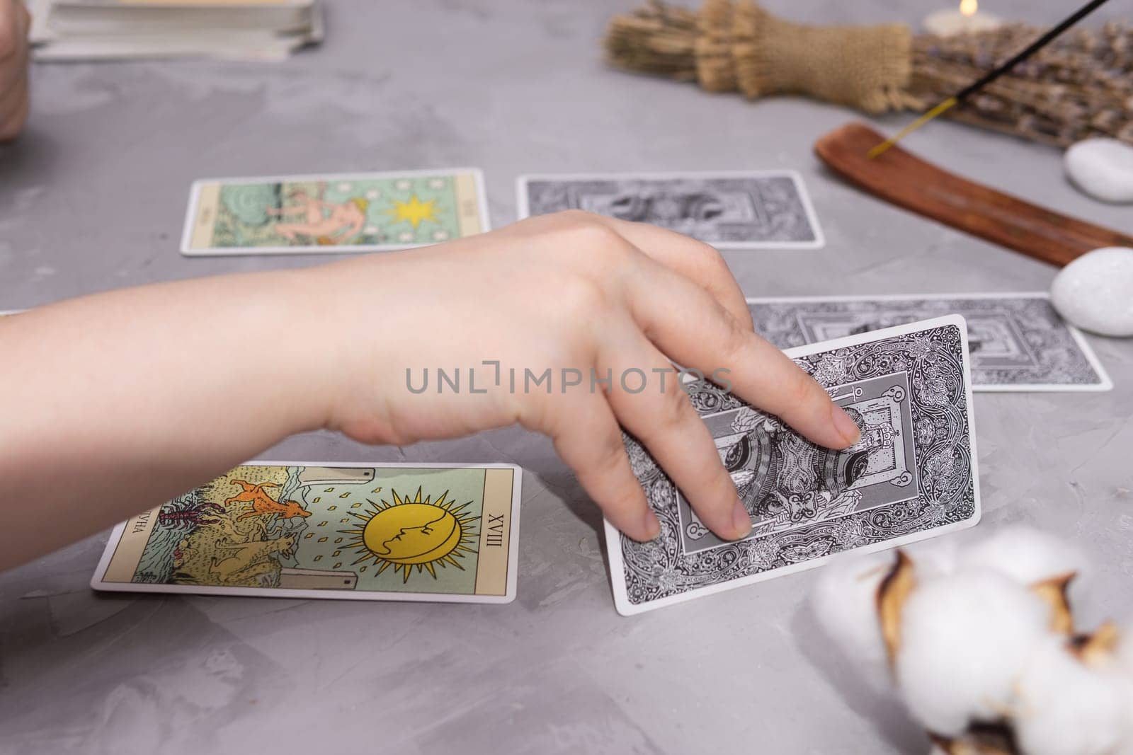 TVER, RUSSIA - FEBRUARY 18, 2024. Tarot cards, Tarot card divination, fortune telling. Occultism, esoteric education