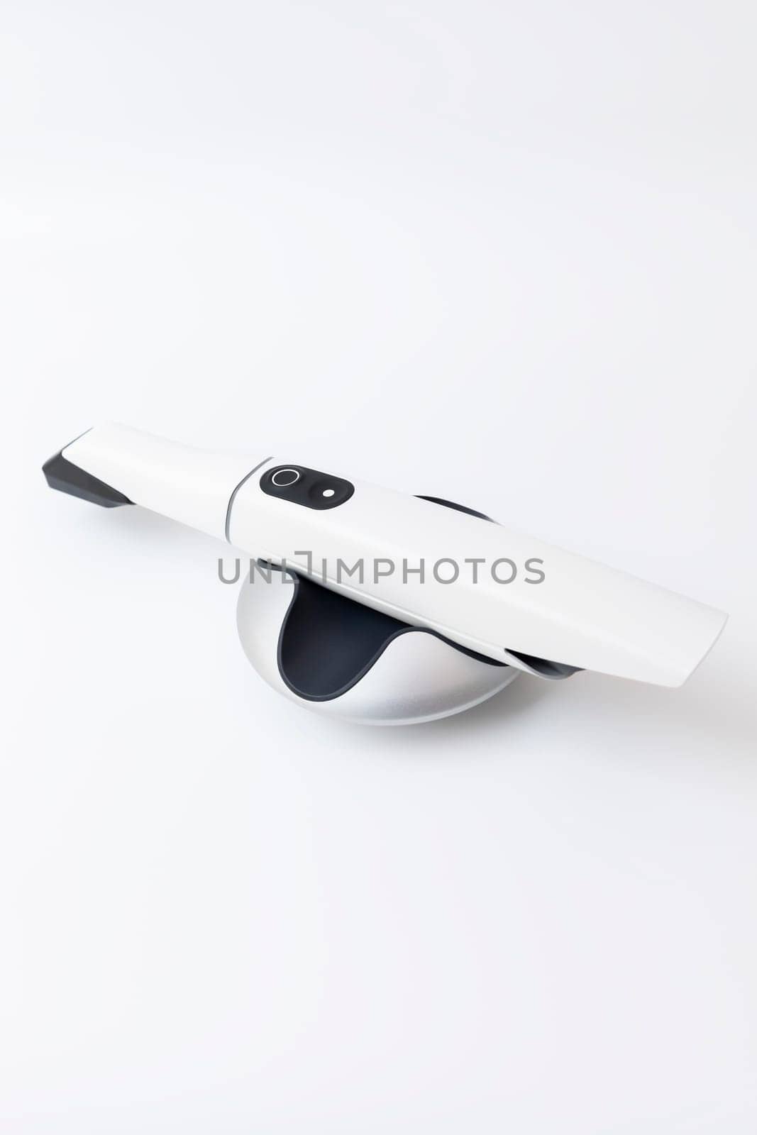 Isolated 3d Dental Tooth Scanner On White Background. Dental Intraoral Equipment, Device For Scanning Teeth. Dentistry And Health Care Concept. Vertical Flat Lay View . High quality photo