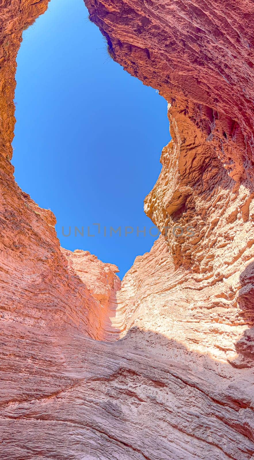 Vertical photo of rock formations in Salta, Quebrada de la Conchas.Used for promotions and advertisements for travel and tourism agencies. Ecological tourism. Exotic landscapes of northern Argentina.