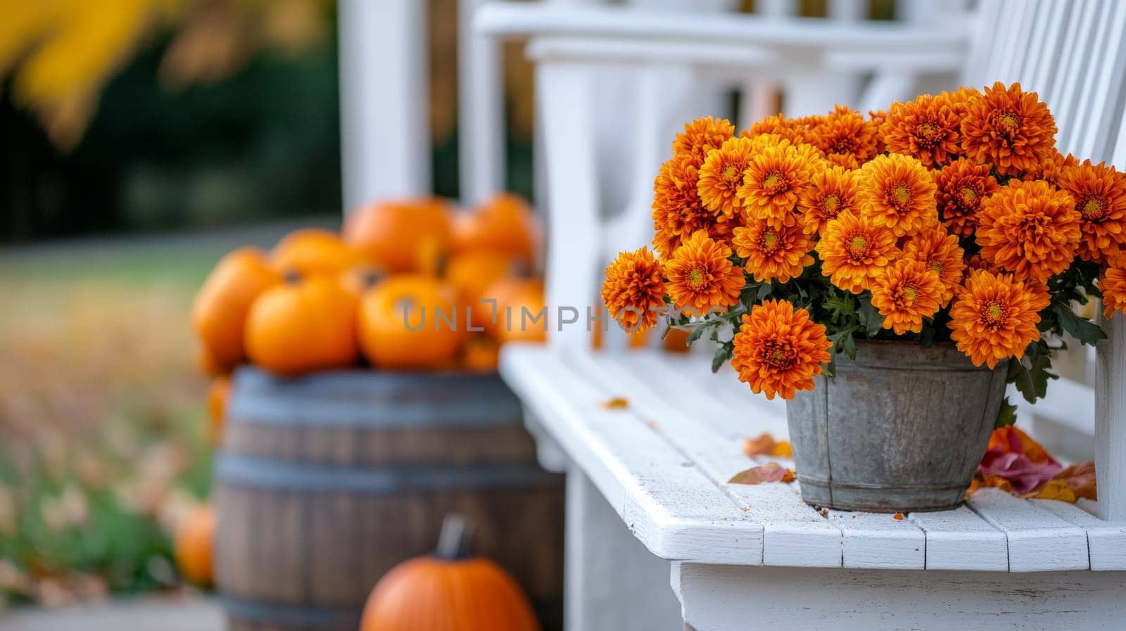 Decorating the porch and front door with pumpkins and fall flowers. Decorating the house for the traditional holiday. High quality photo