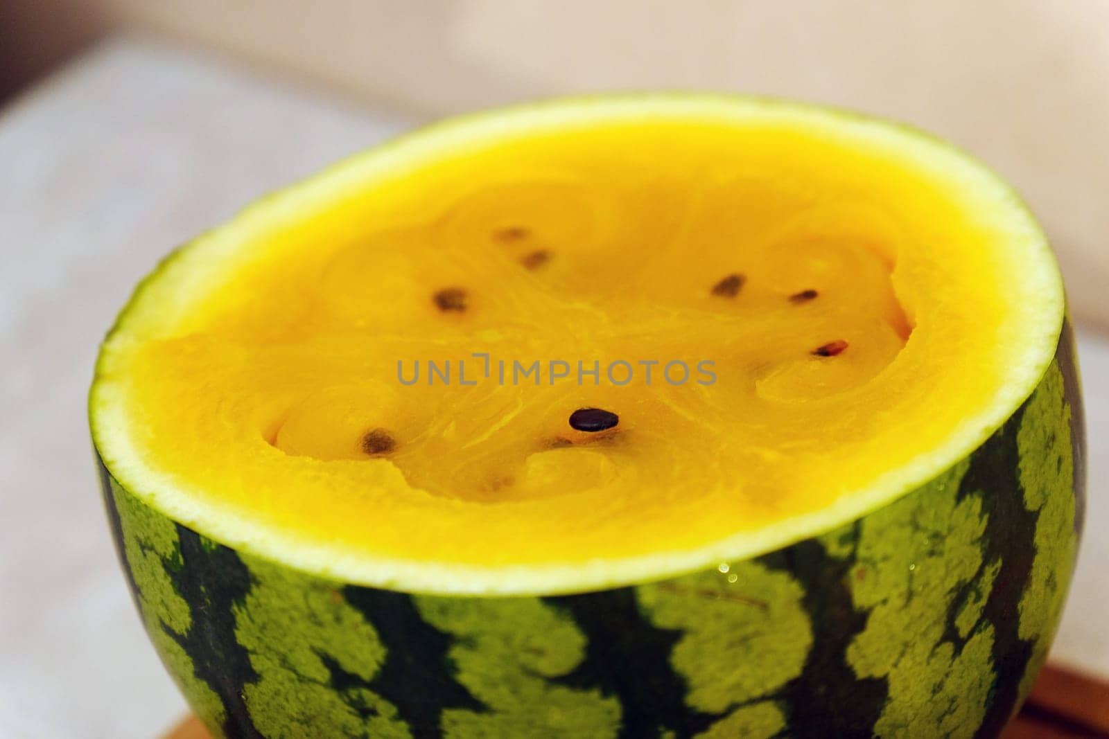 Delicious yellow watermelon sliced open to reveal its vibrant, sweet interior, perfect for summer