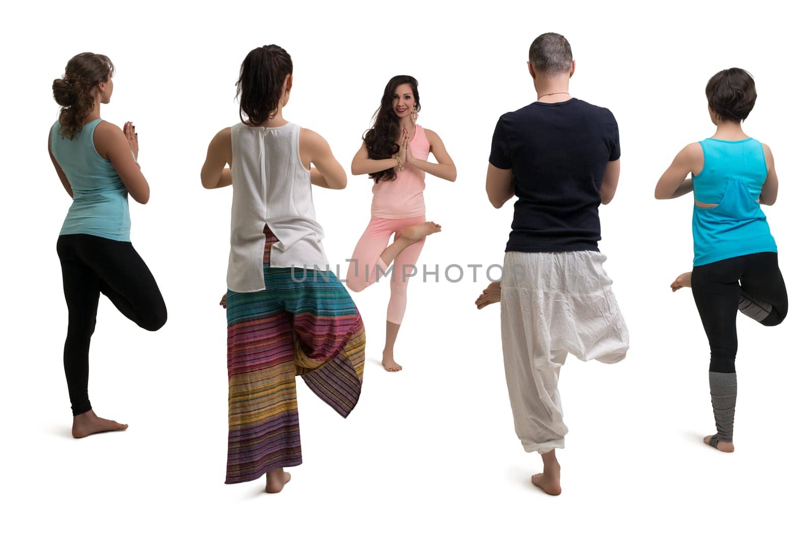 Group of women and their male trainer in sportswear doing yoga view isolated on white