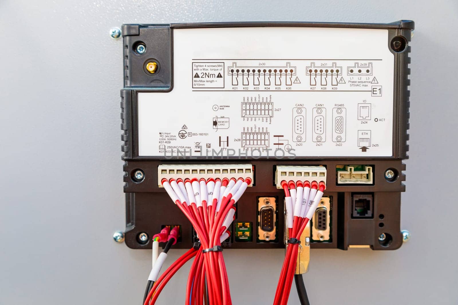 Close-up of a plc showcasing its intricate wiring, connectors, and advanced technology for industrial automation and control systems