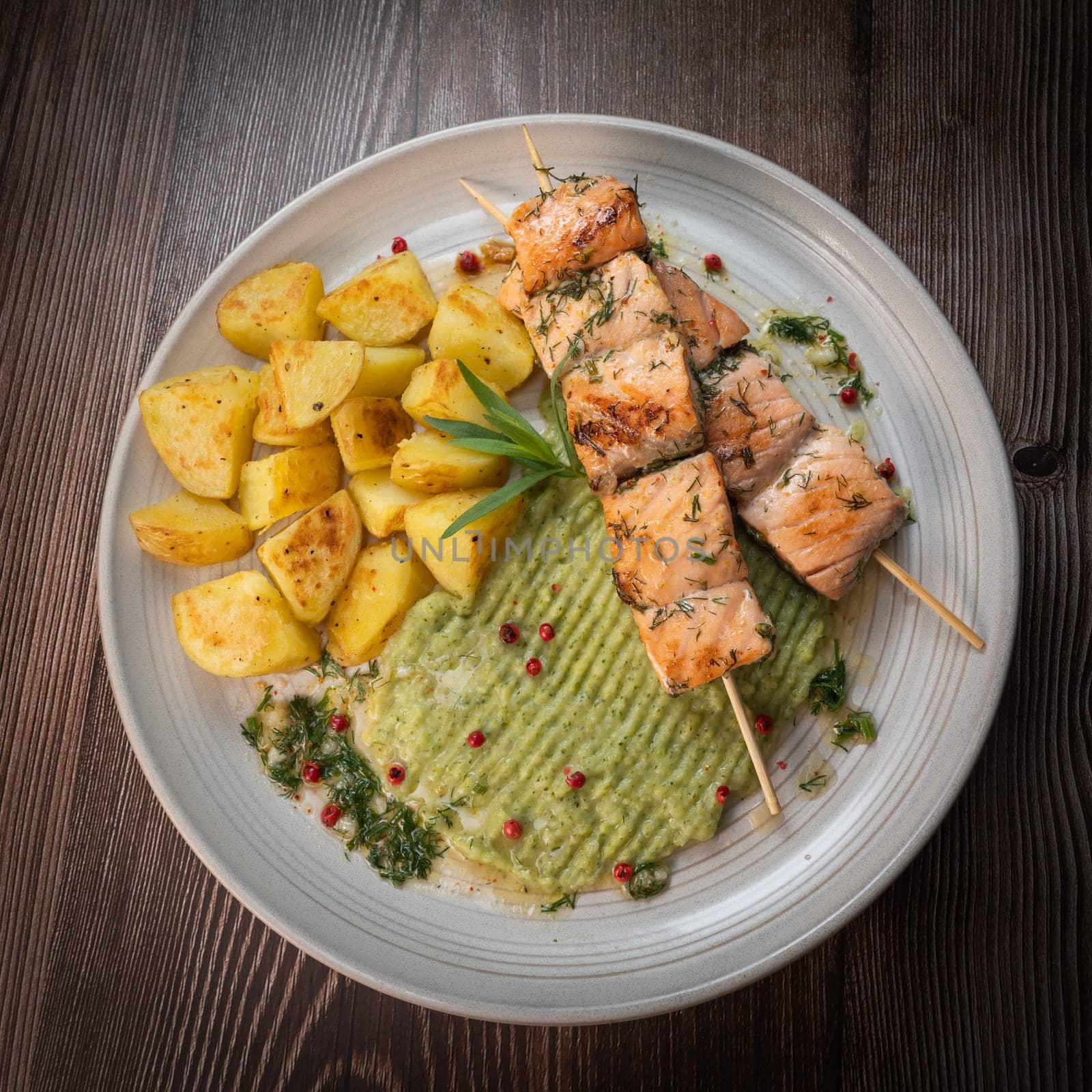 Barbecued salmon skewer with potatoes and broccoli Puree, High quality photo