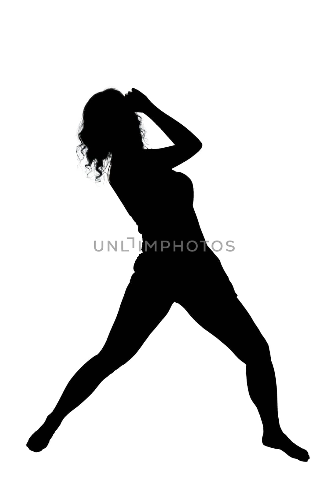 A graceful silhouette of a woman elegantly standing in a yoga pose against a pristine white background, highlighting her serene posture