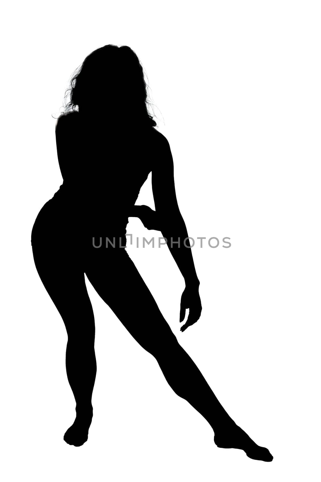 A beautiful silhouette of a woman gracefully dancing against a pristine white background that draws the eye immediately to her movement
