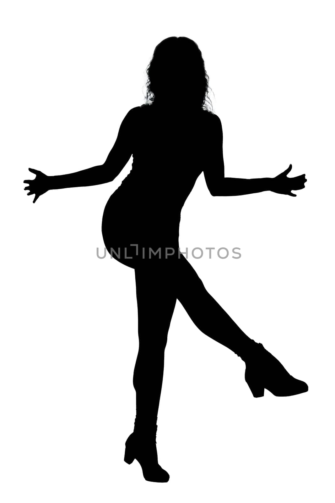 A striking silhouette of a woman gracefully standing on just one leg, with her arms fully outstretched in a beautiful pose