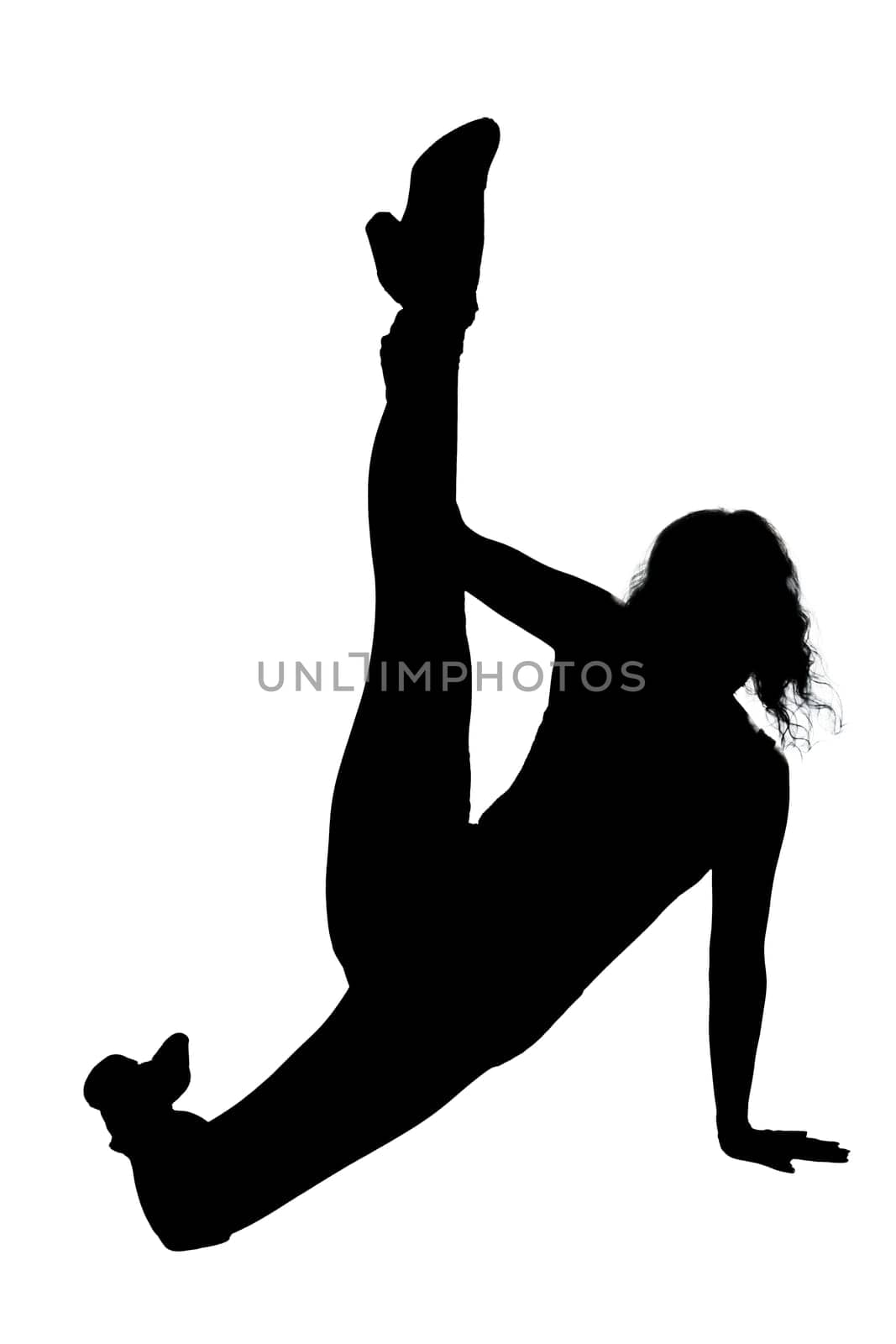 A graceful silhouette of a woman delicately stretching her legs against a minimalistic white background, creating a serene atmosphere