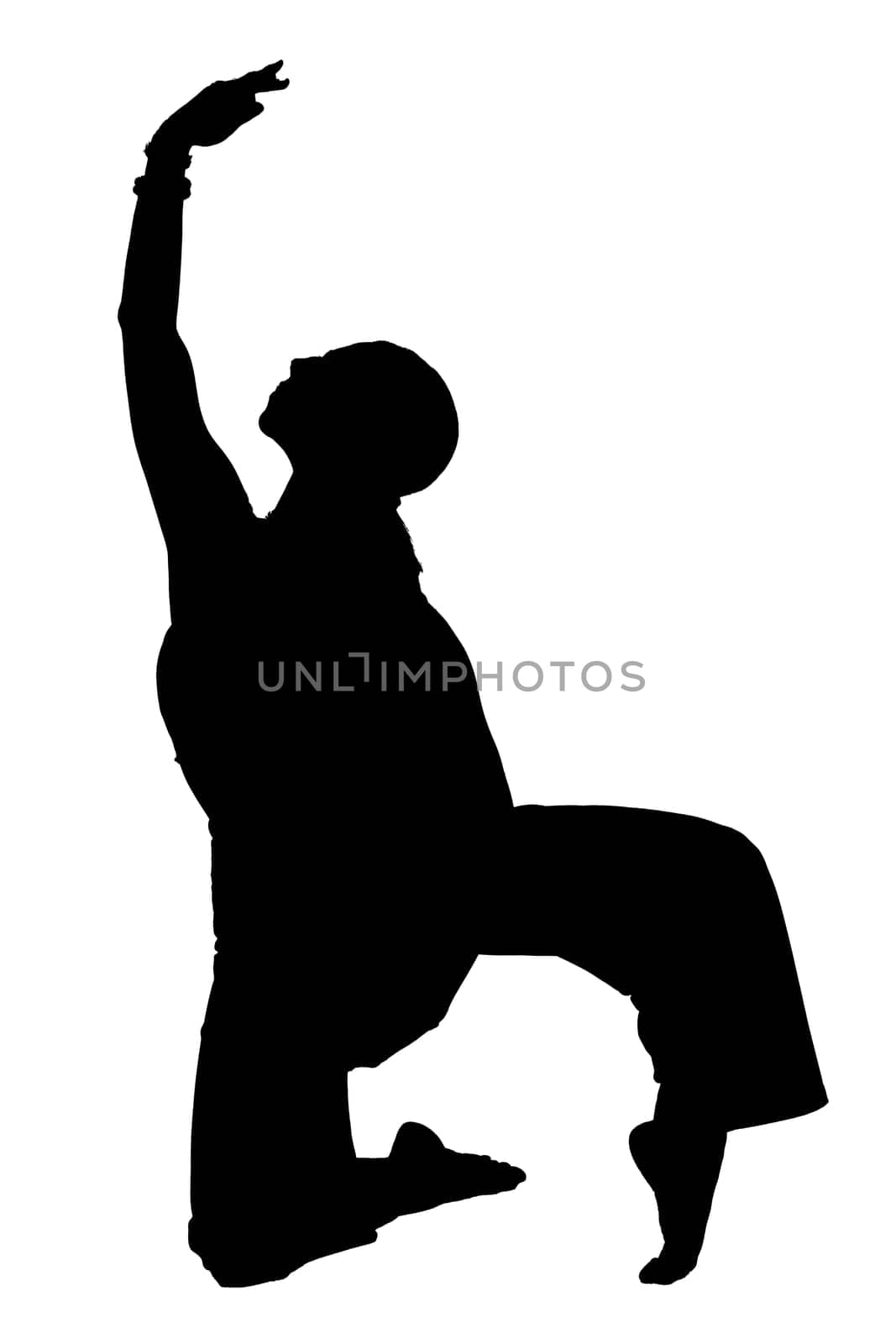 A dark silhouette of a person who is kneeling down with their arms outstretched wide, reaching towards the sky in a graceful pose