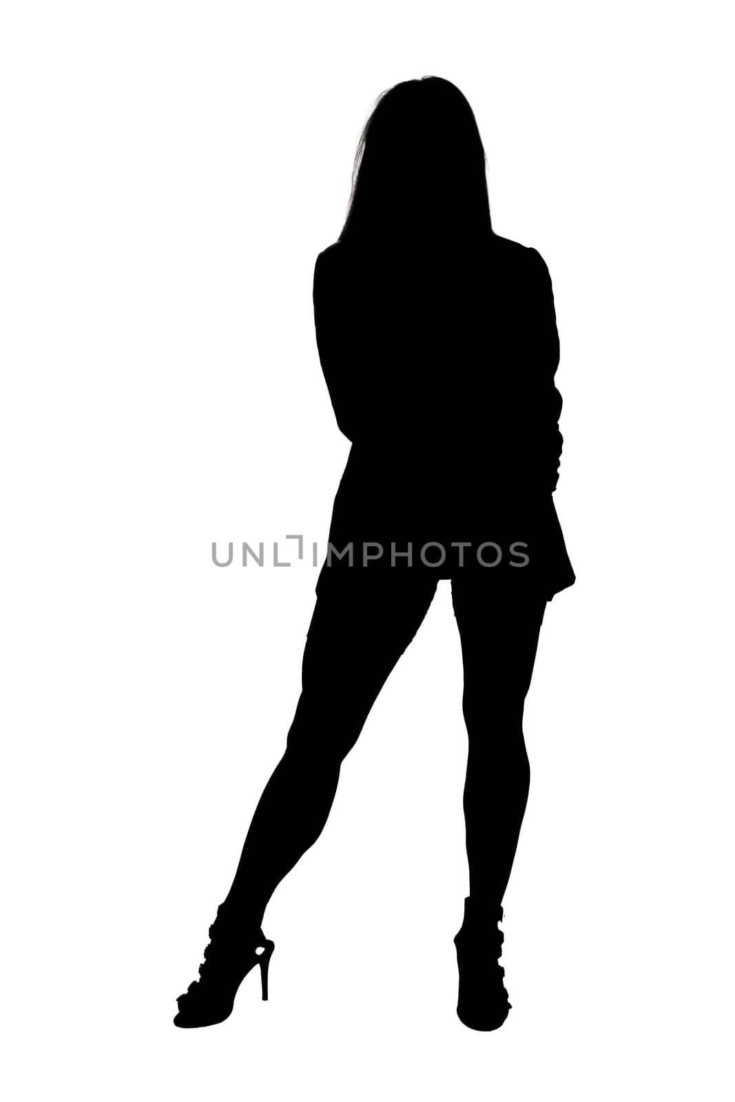 A striking silhouette of a woman elegantly standing against a clean, white background, emphasizing her graceful form and posture