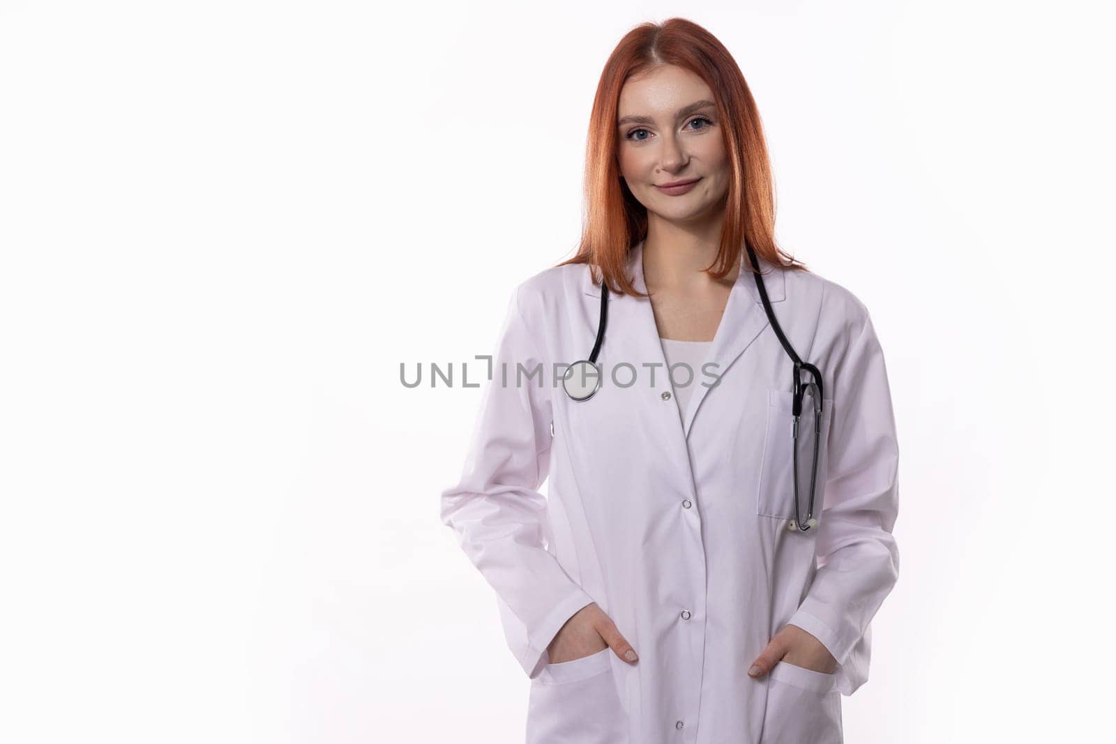 A professional and skilled young woman doctor, confidently wearing a lab coat, radiating care and compassion