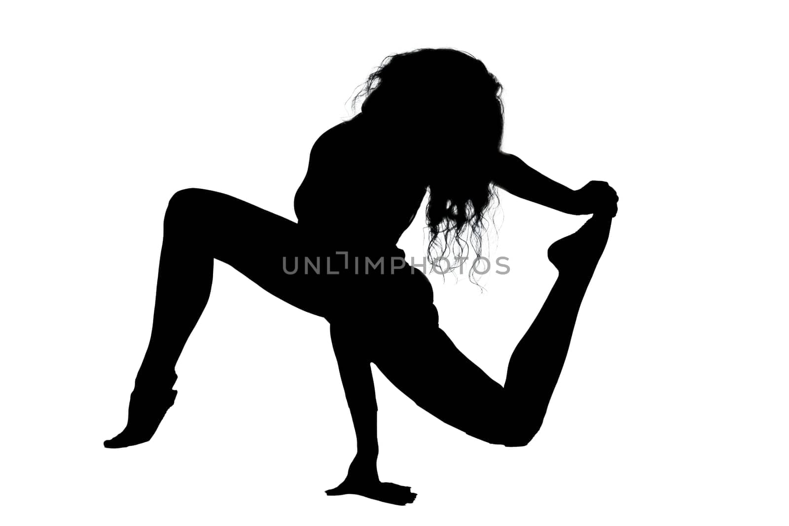 A graceful silhouette of a woman performing an elegant yoga pose against a clean and bright white background that enhances her form