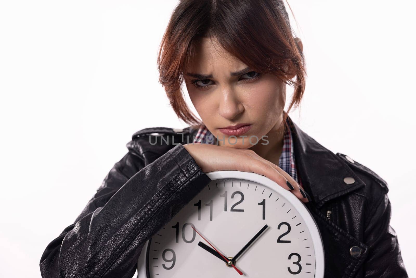A woman holding an ornate clock in her hands, embodying deep contemplation and the elusive passage of time