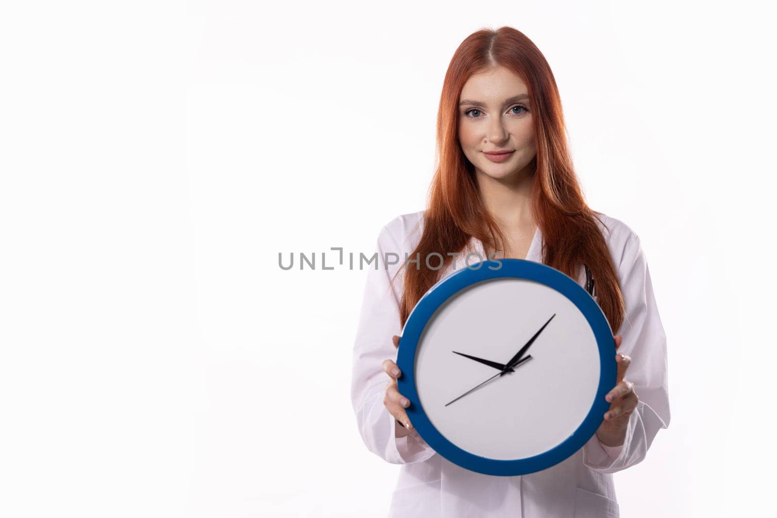 A woman with vibrant red hair holds an intricate clock, symbolizing time management and productivity skills