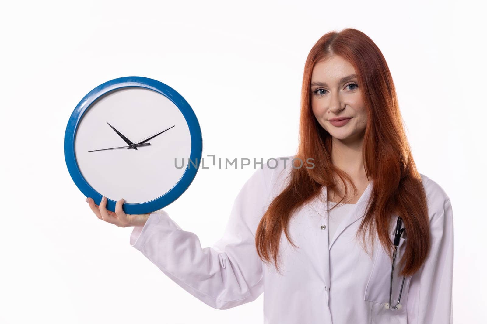 A doctor holding a clock symbolizes the crucial importance of effective time management in healthcare practices