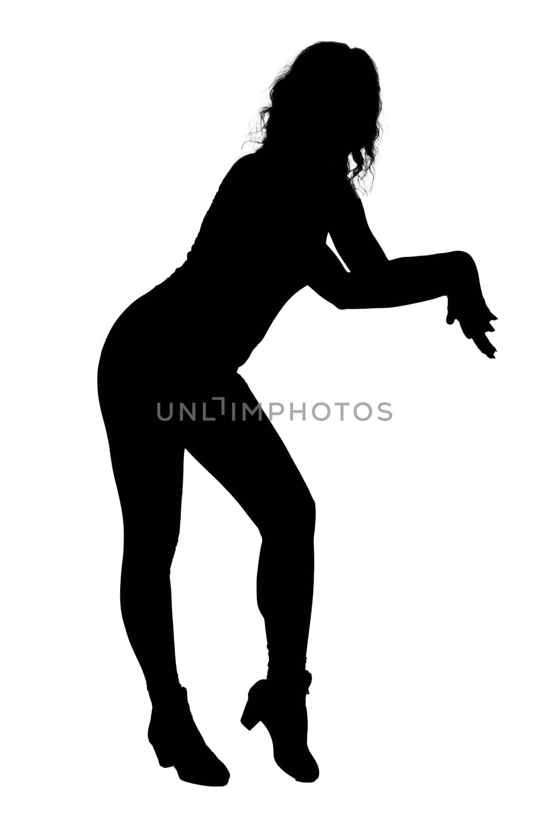 An elegant silhouette of a woman gracefully dancing against a pure white background, highlighting her fluid motions and joyful expression