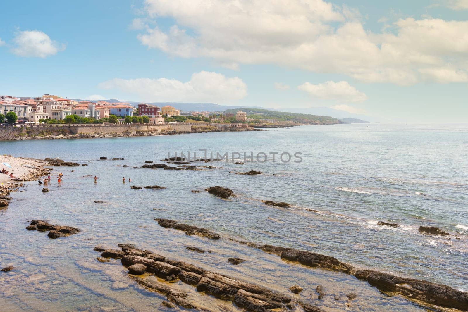 View of the sea coast in Alghero on a summer day