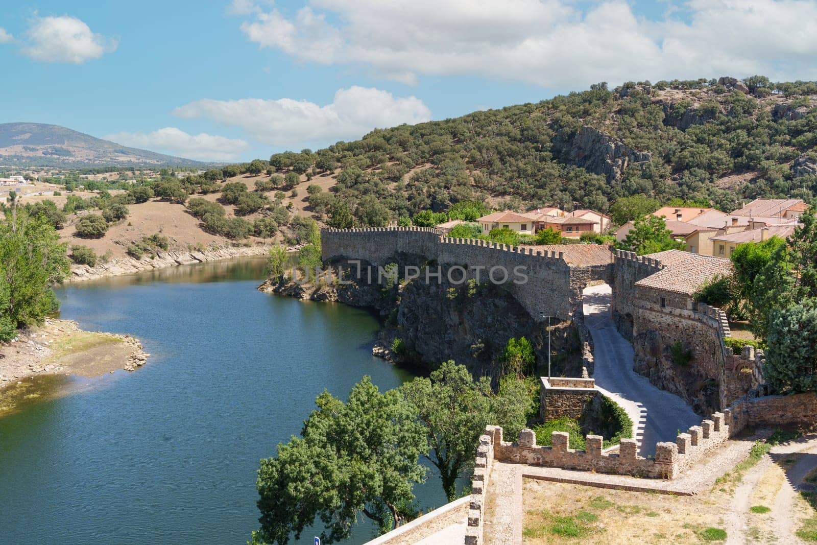 Panoramic view of Buitrago de Lozoya with the river and the walls, Community of Madrid, Spain