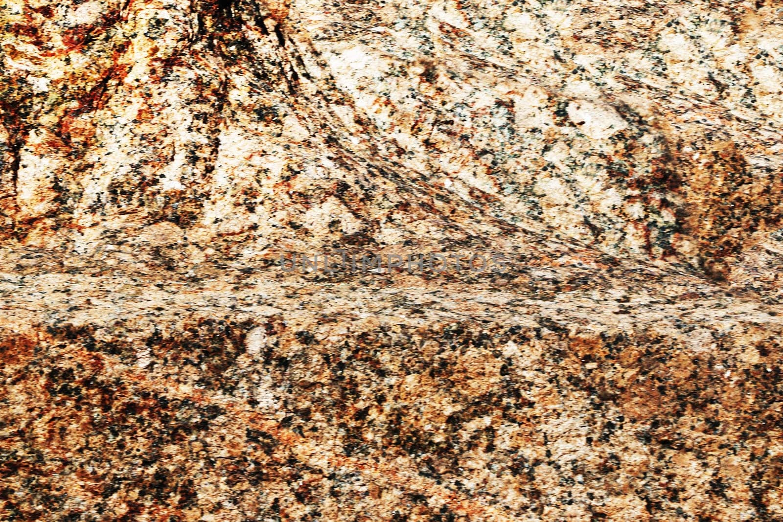 Granite texture. Natural red granite with a grainy pattern. Stone background. Solid rough surface of rock.