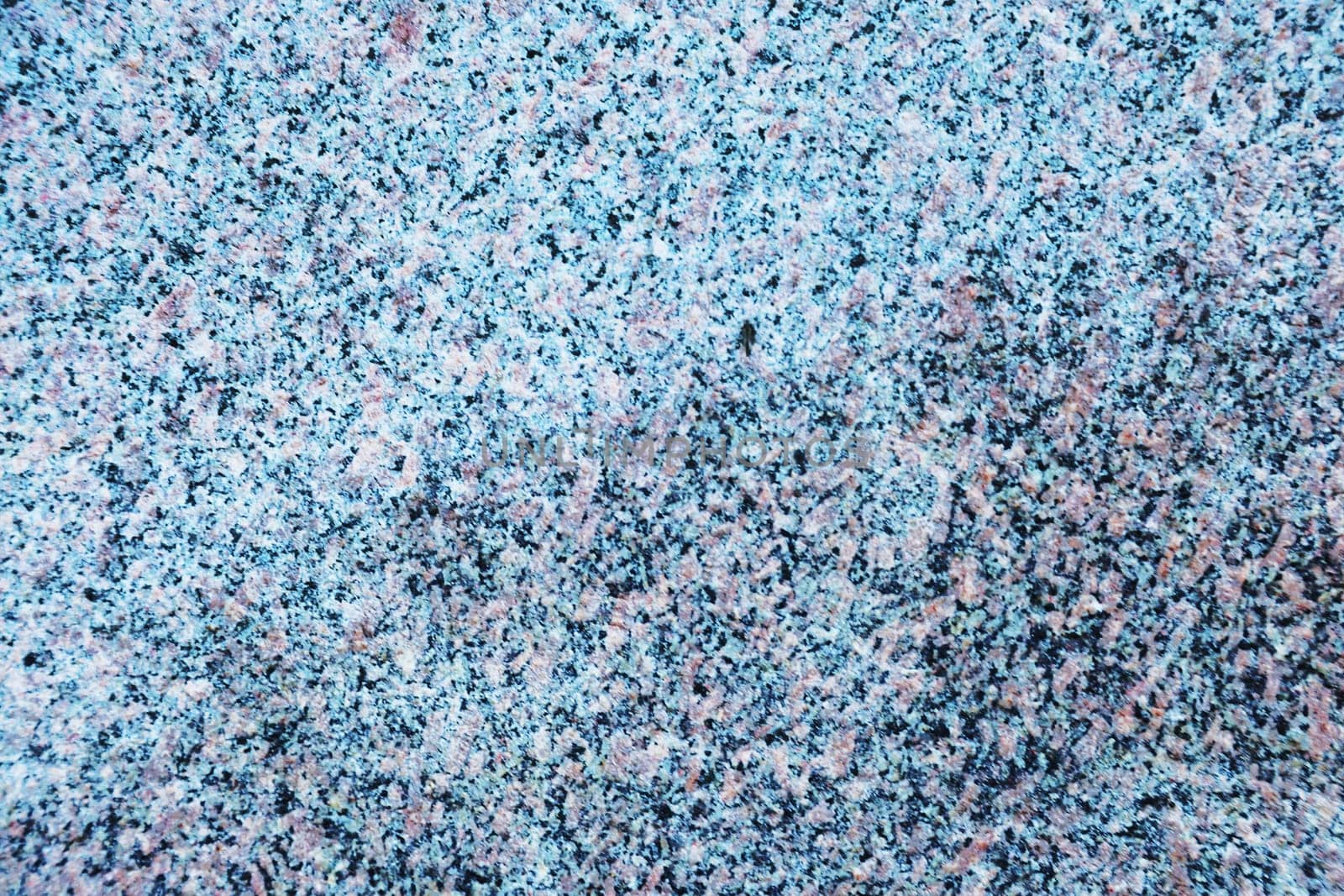 Surface of blue granite slab. Stone floor close-up.