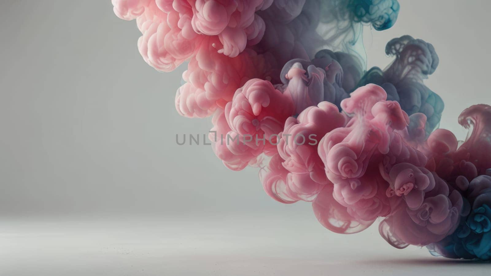 Pastel Ink in Water Creating an Ethereal Dreamlike Image with Blue and Pink Colors.