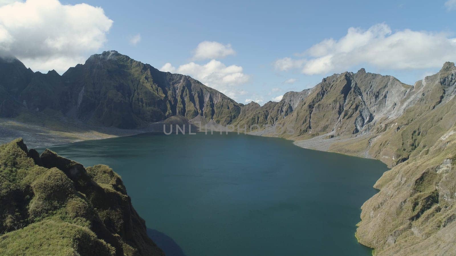 Crater lake of the volcano Pinatubo among the mountains, Philippines, Luzon. Aerial view beautiful landscape at Pinatubo mountain crater lake. Travel concept