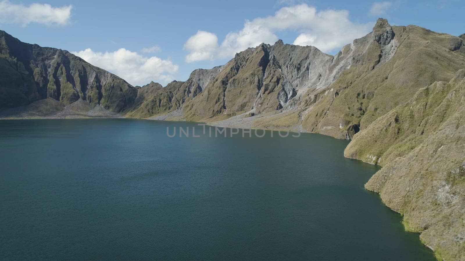 Crater lake of the volcano Pinatubo among the mountains, Philippines, Luzon. Aerial view beautiful landscape at Pinatubo mountain crater lake. Travel concept