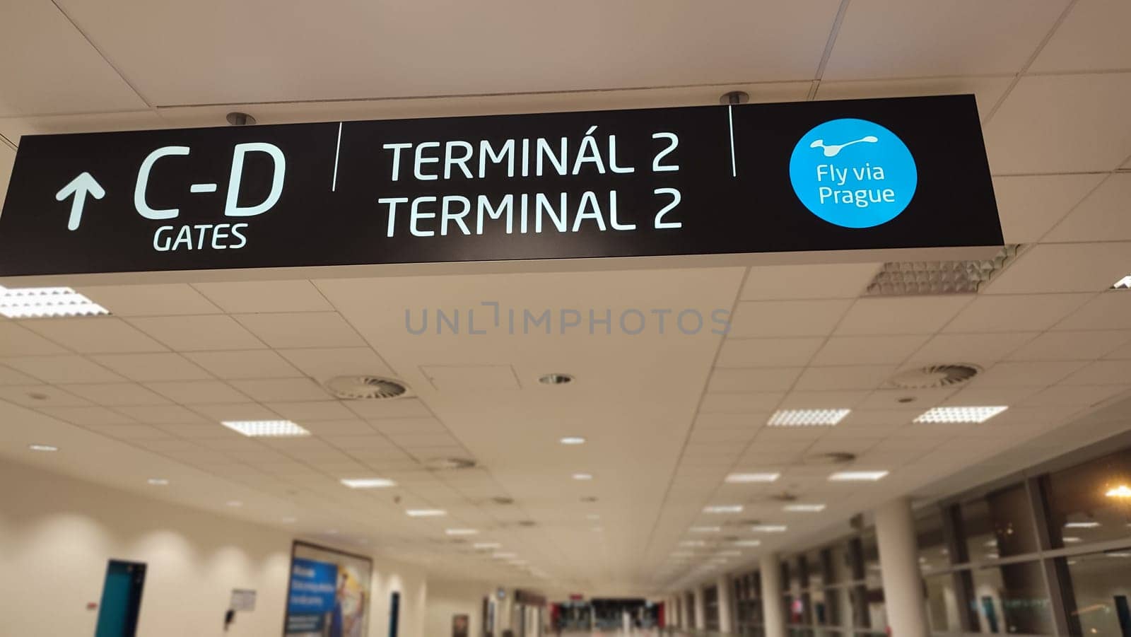 October 26, 2024 Europe Prague Czech Republic, Vaclav Havel Airport, Terminal 2 lobby, direction sign to C and D gates. High quality photo
