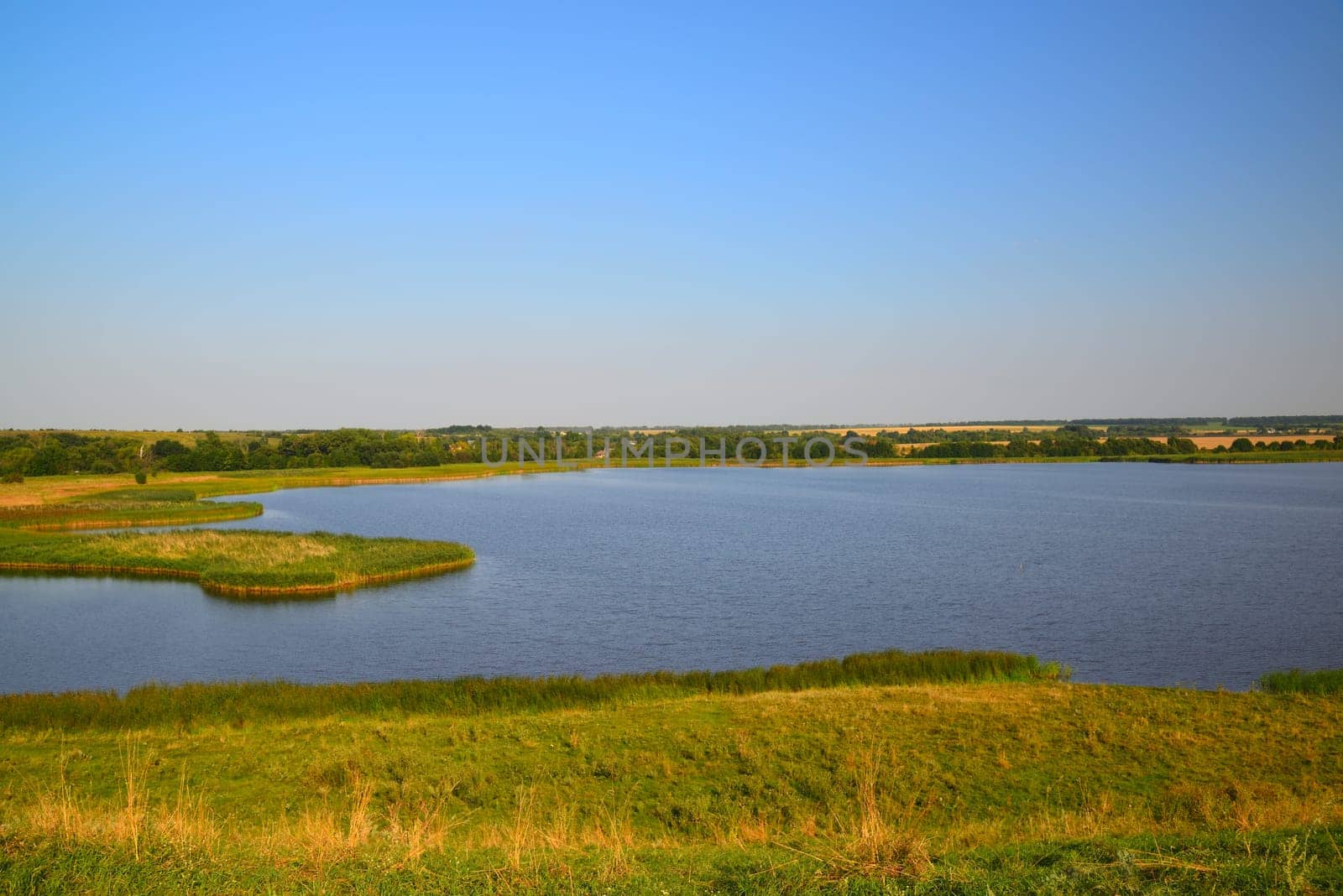 Autumn landscape with pond in Russia