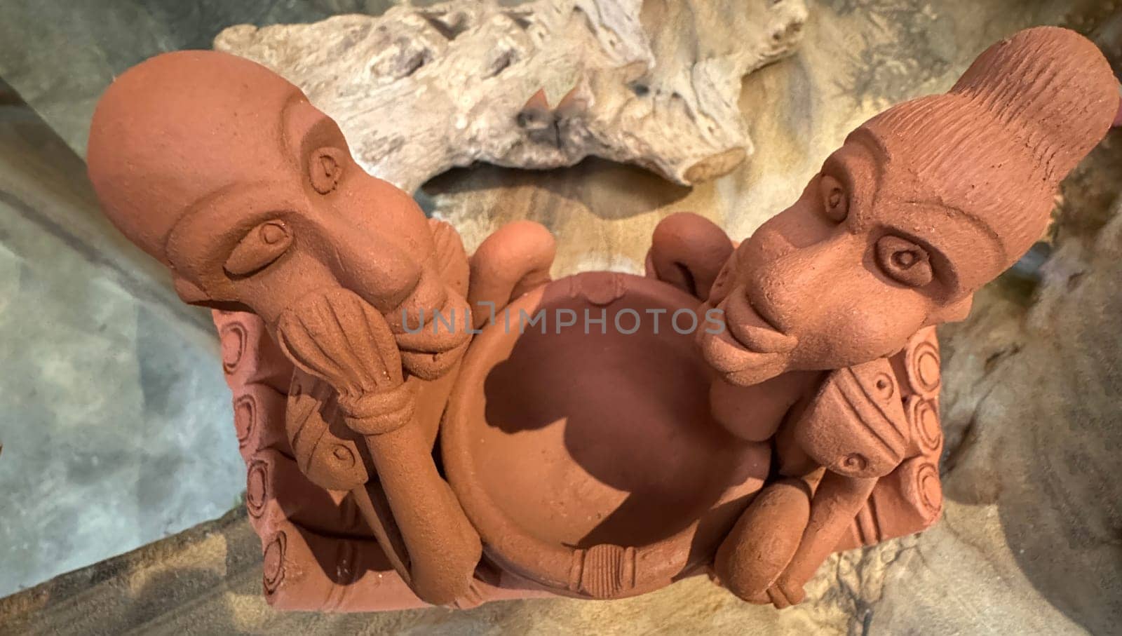 clay sculptures showcasing cultural artistry and expression. The intricate details highlight craftsmanship and creativity, providing a unique perspective on cultural art good for multimedia content creation