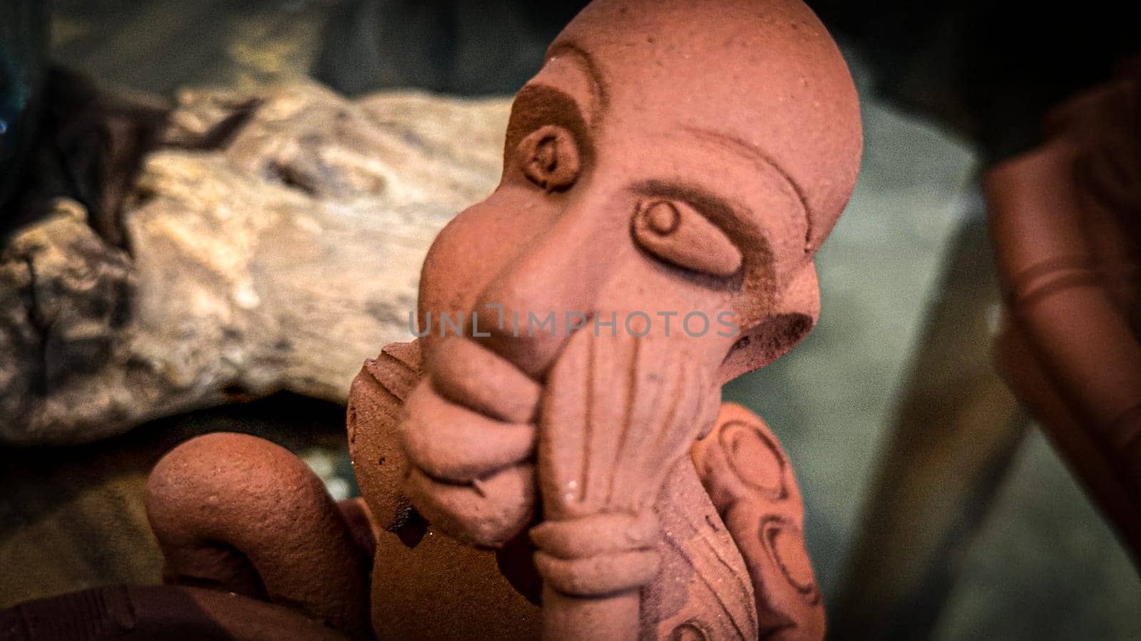 clay sculptures showcasing cultural artistry and expression. The intricate details highlight craftsmanship and creativity, providing a unique perspective on cultural art good for multimedia content creation
