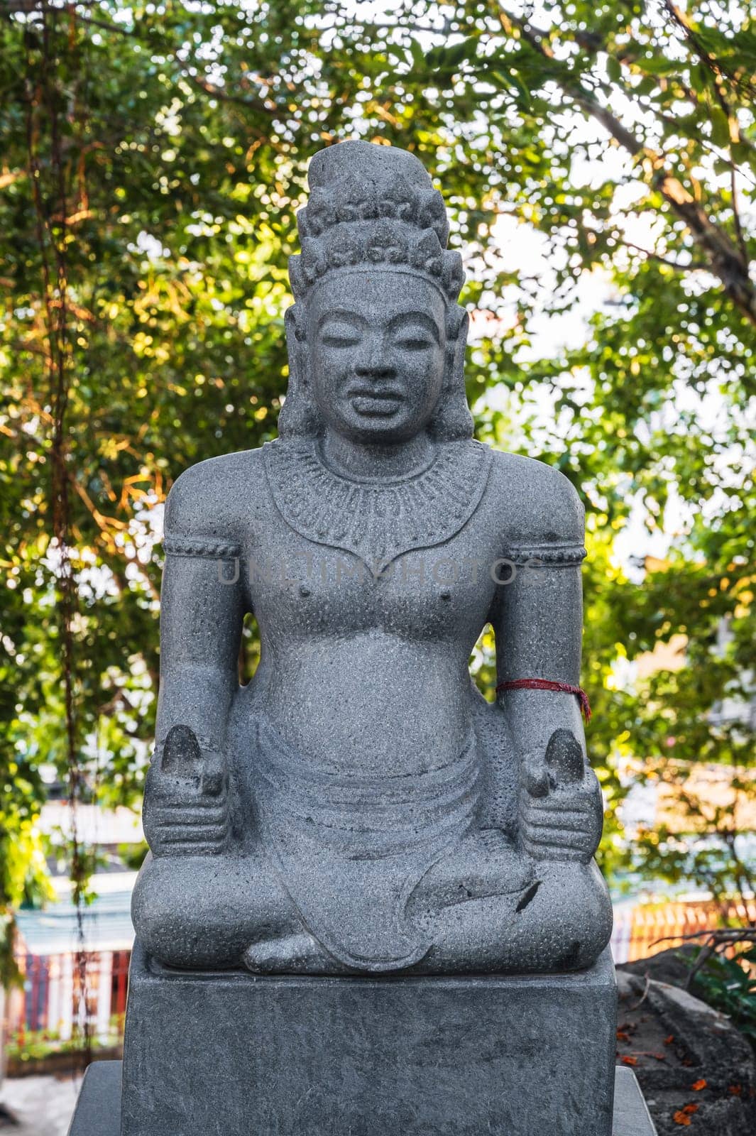 Buddhist statue of the deity in the park at pagoda at the Cham Towers in Nha Trang in Vietnam