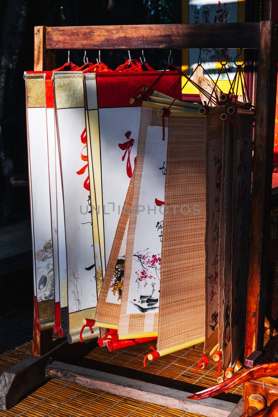 Scrolls with manuscripts and hieroglyphs in a souvenir shop in Asia