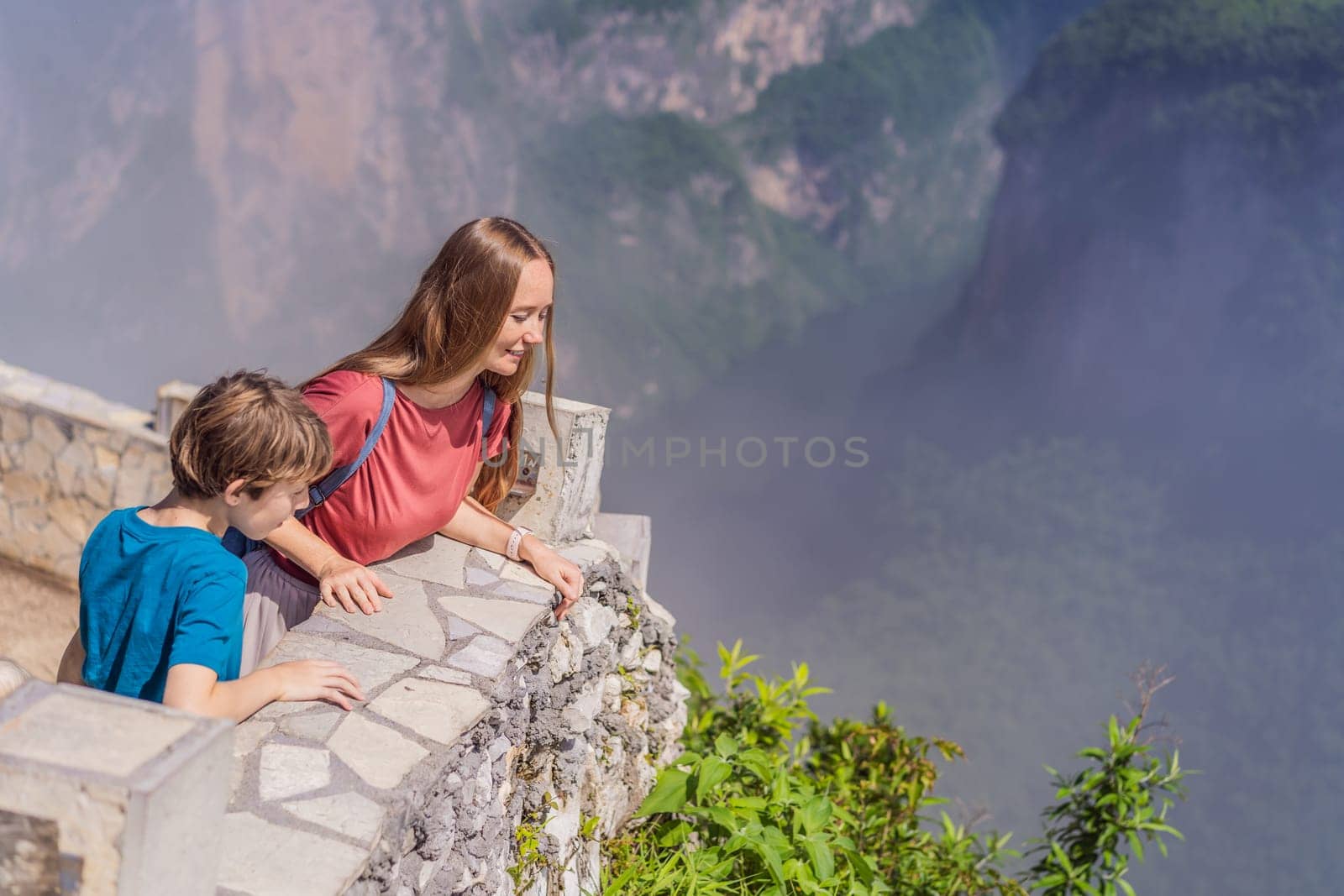 Mom and her son travelers exploring Sumidero Canyon National Park, Mexico. Adventure, natural exploration, and travel experience concept.