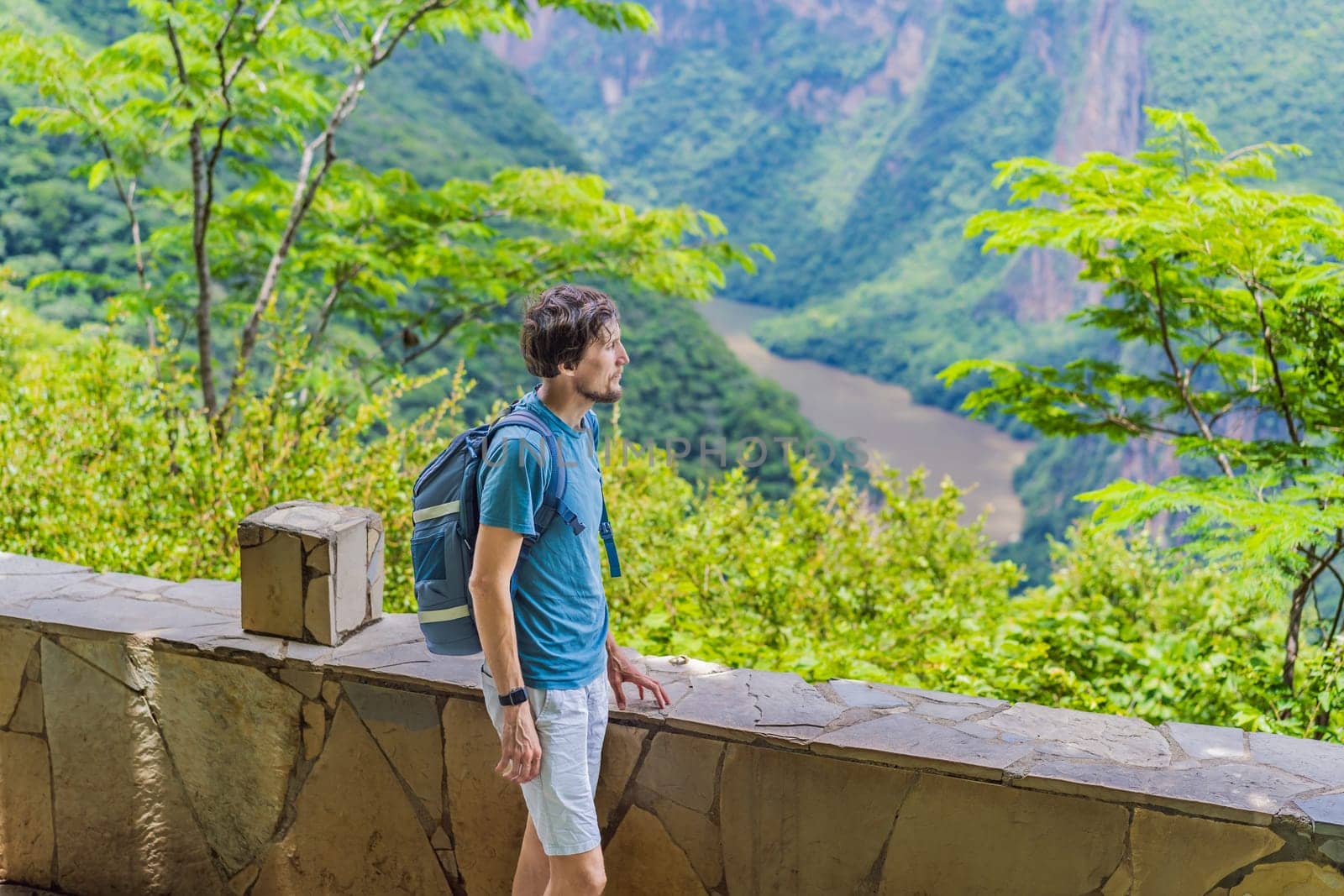 Male tourist exploring Sumidero Canyon National Park, Mexico. Adventure, natural exploration, and travel experience concept.