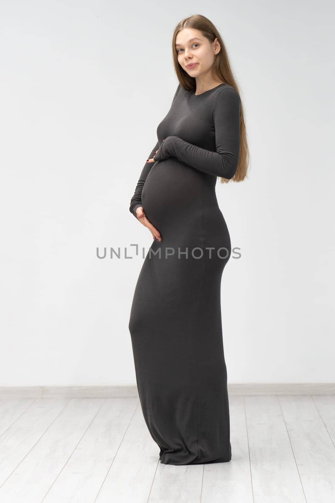 female pregnancy positive motherhood black girl maternity dress background tummy expectant mother