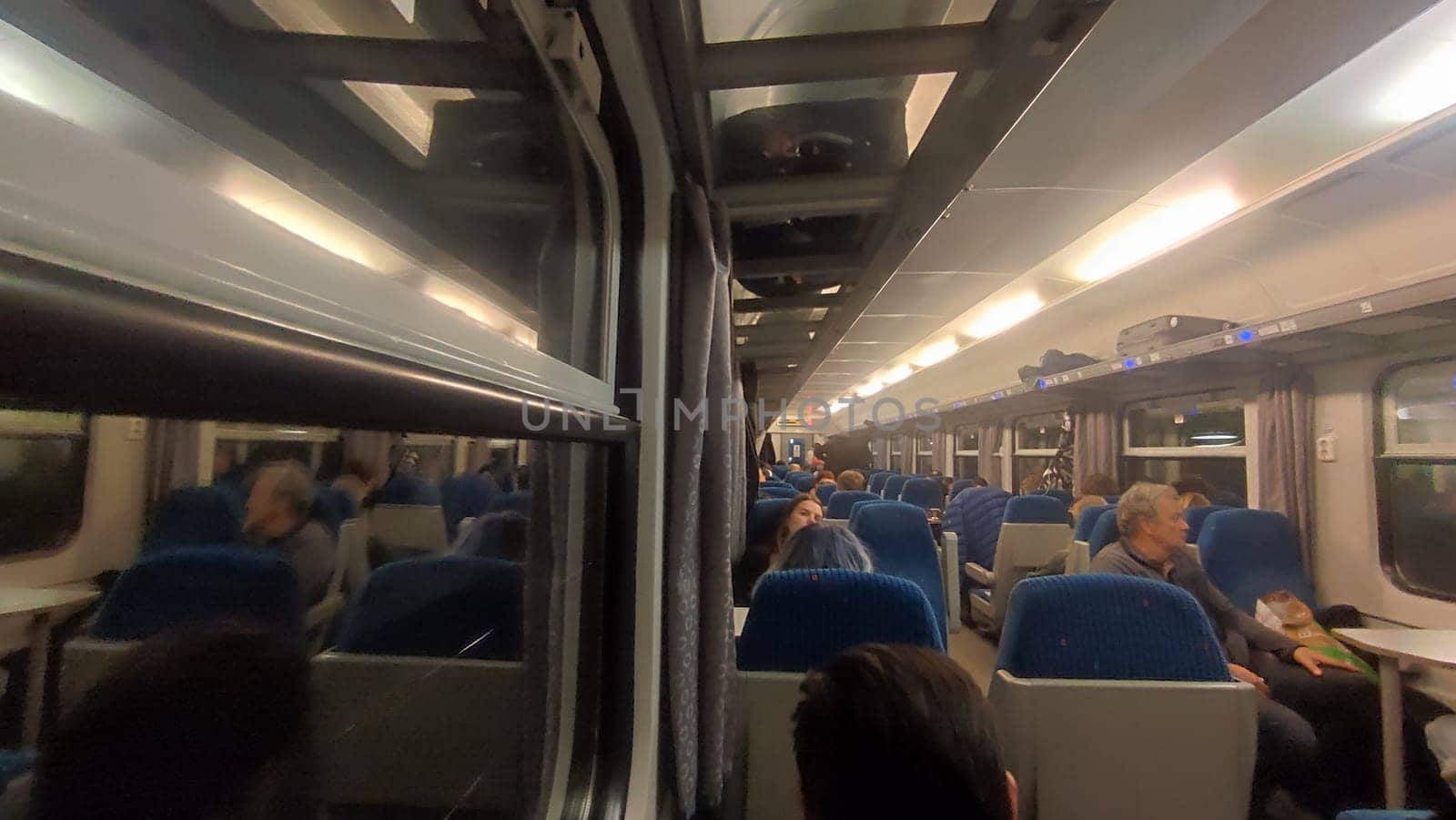 October 23 2024 Prague city Czech Republic Europe, window and interior of a passenger train, transport, movement, industry, people, travel . High quality editorial photo