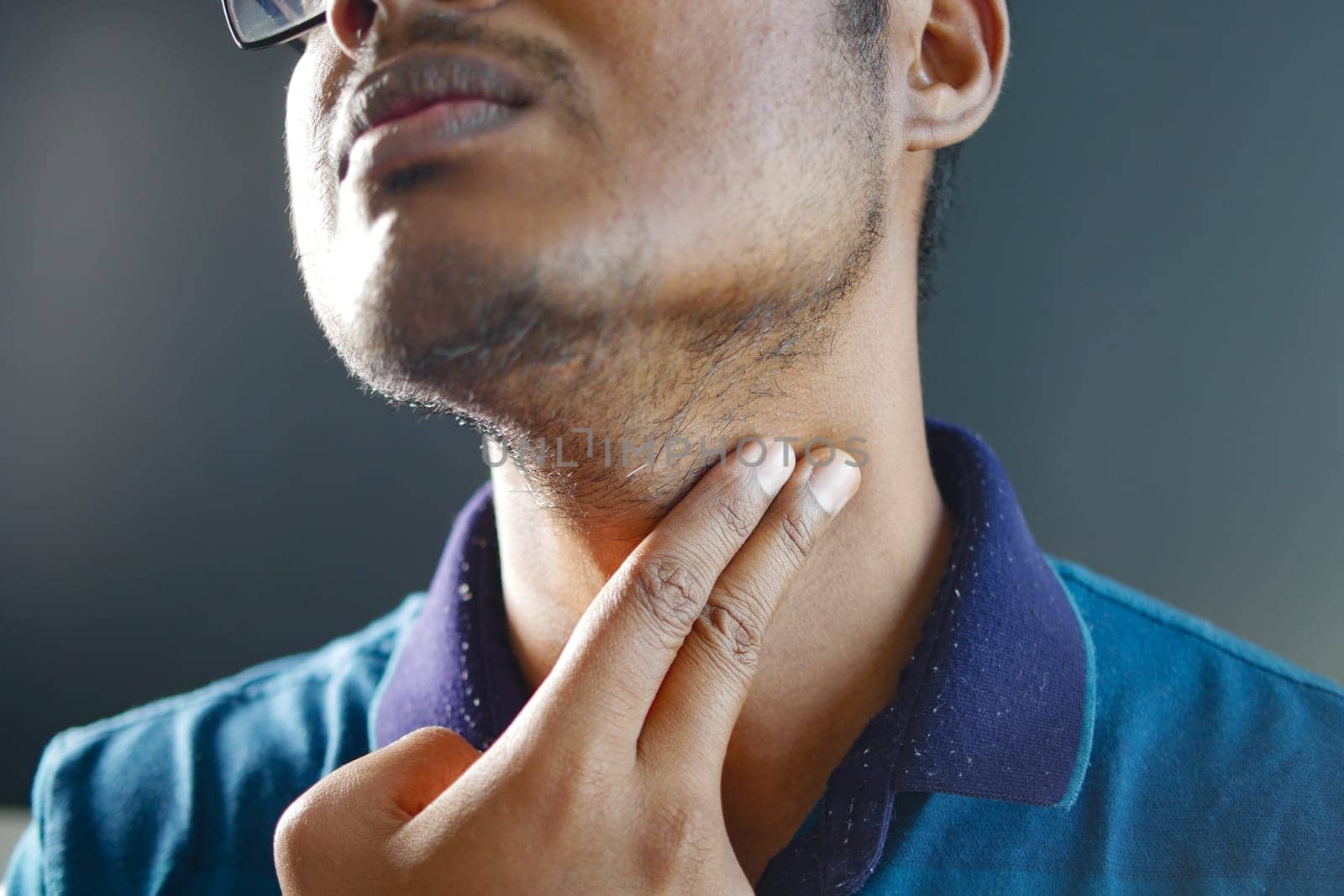 Unrecognized Man Touching His Neck To Control Blood Pressure by towfiq007