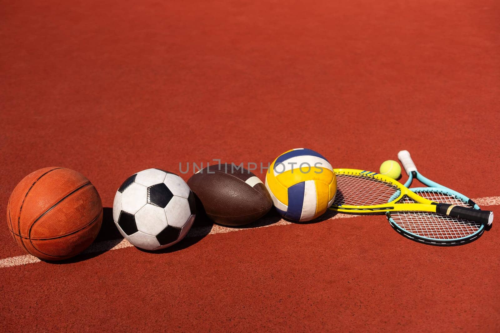 Set of sport equipment, soccer basketball balls and tennis rackets by Andelov13